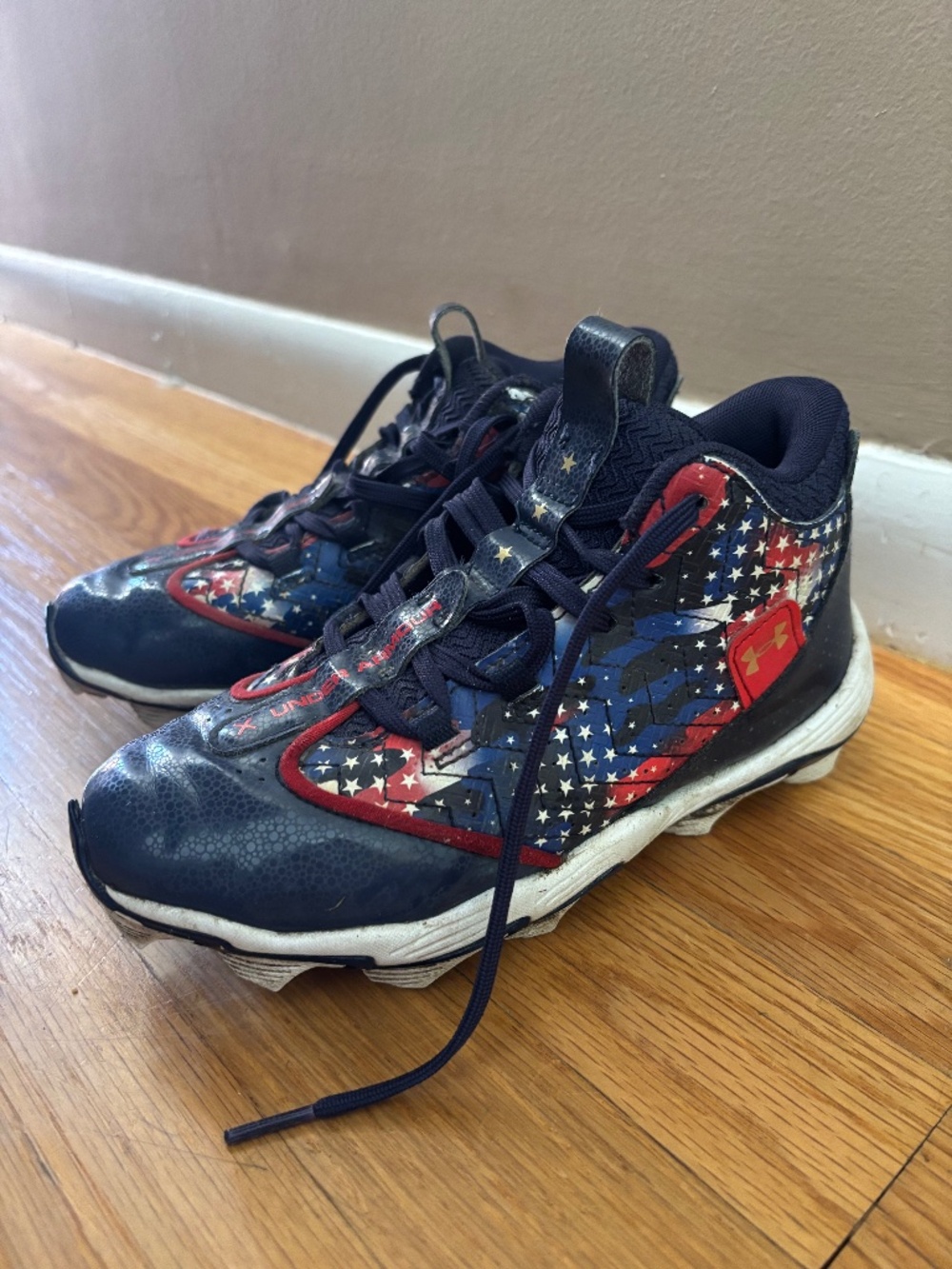 Under Armour Football/ Baseball cleats size 2